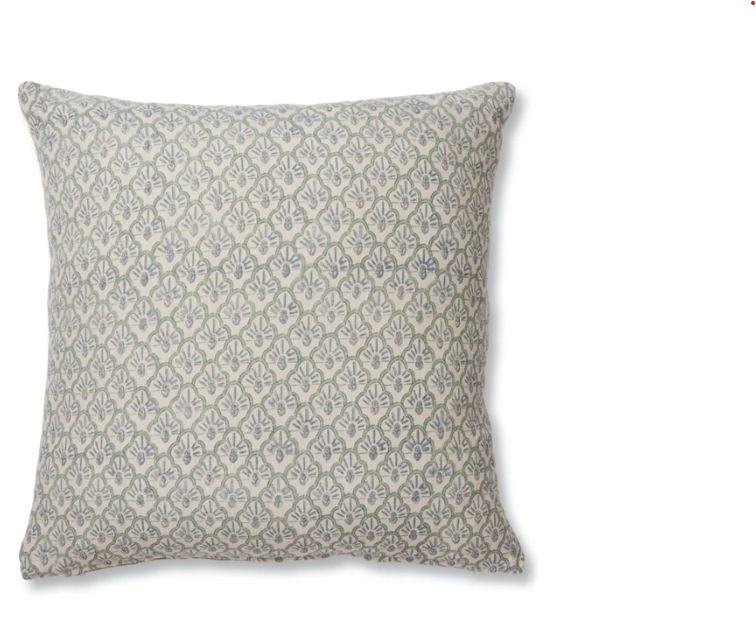 Decorative pillow with a subtle pattern on a white background