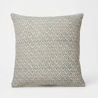 A square throw pillow featuring a repeating muted sage green and beige geometric block print pattern, shown against a plain white background.