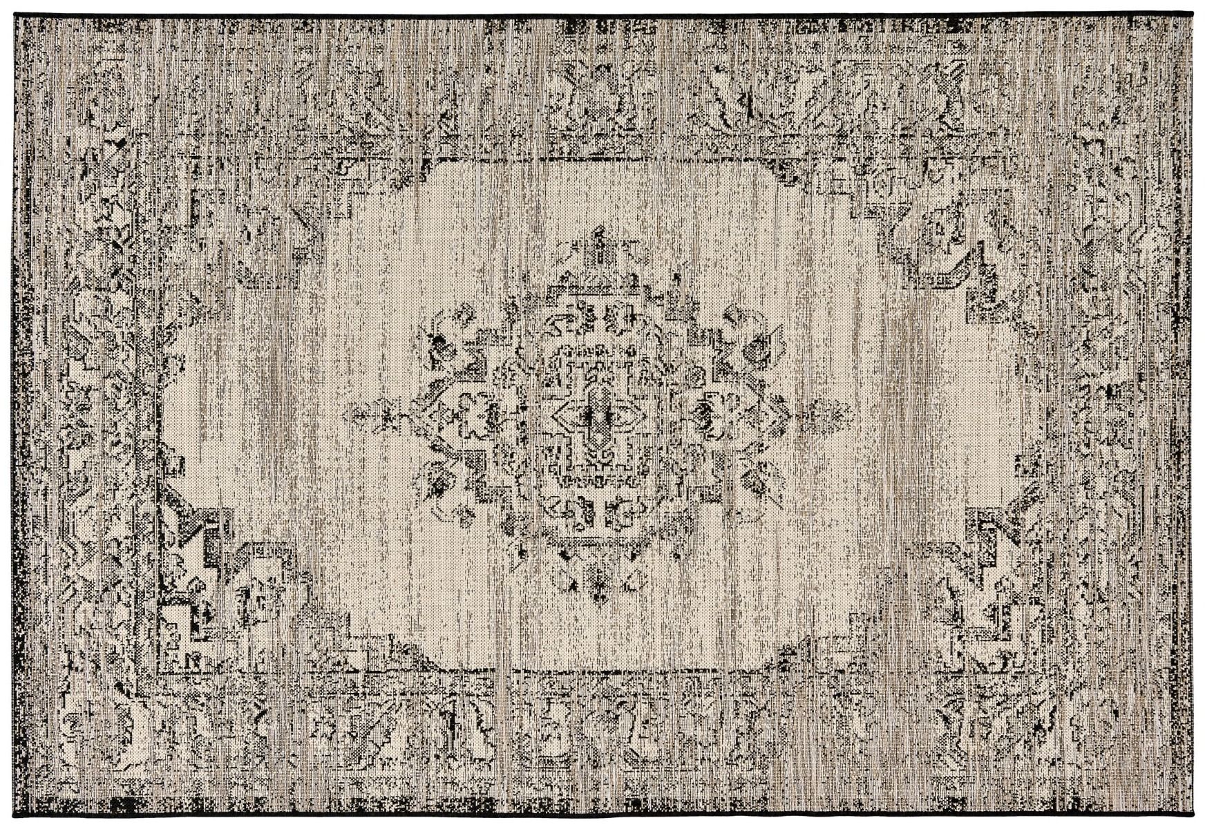 Decorative area rug with intricate patterns in neutral colors