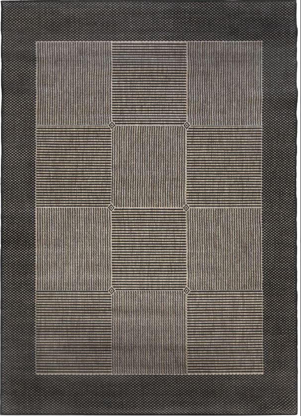 Gray geometric patterned rug on a plain background