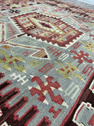 Close-up of a patterned rug with geometric design