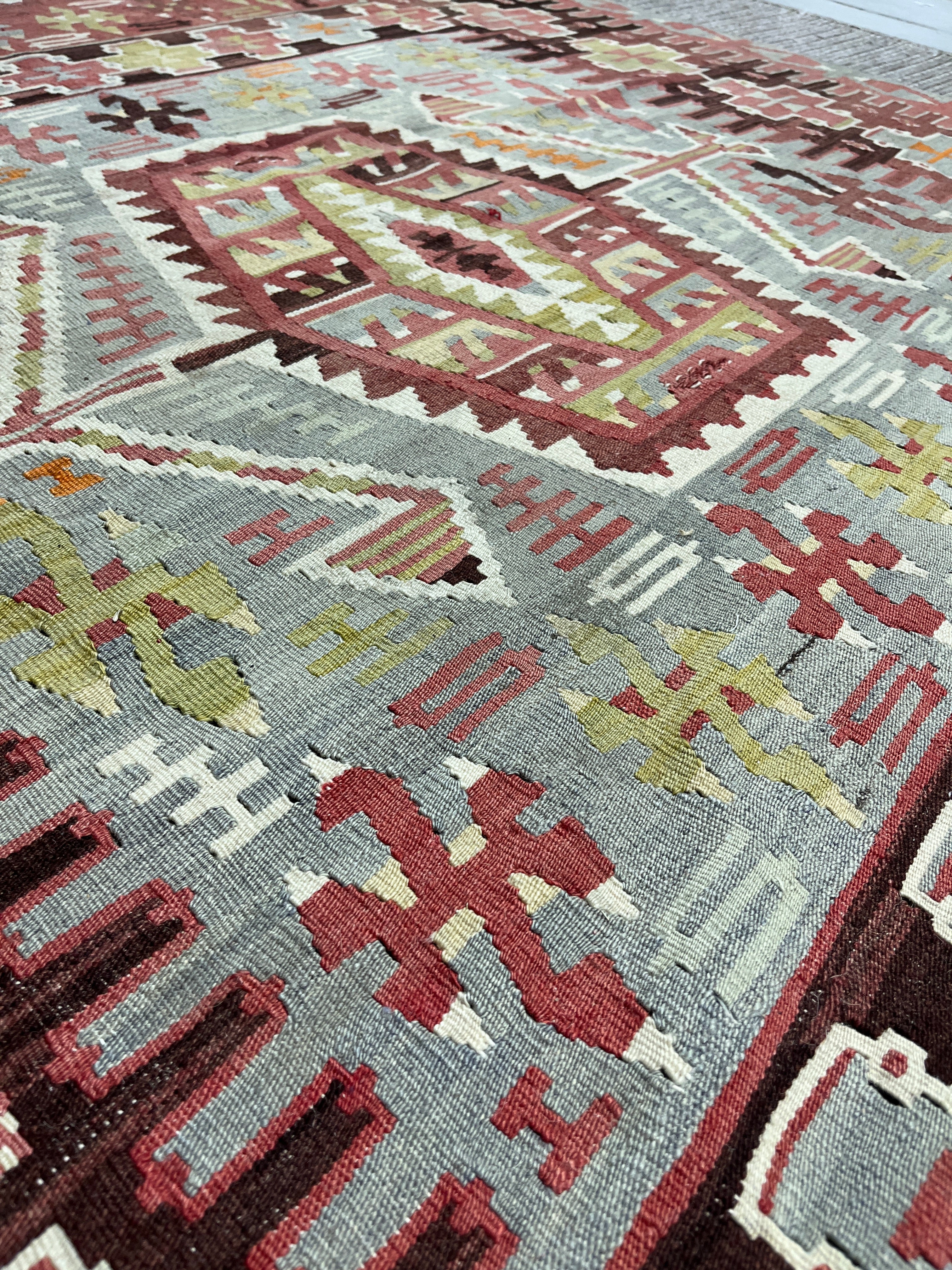 Close-up of a patterned rug with geometric design