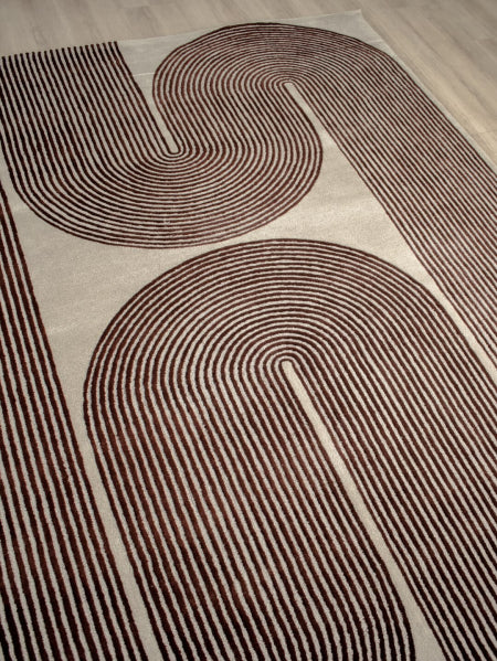 Rug with brown abstract pattern on a beige background