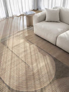 Modern living room with a circular patterned rug and a beige sofa.