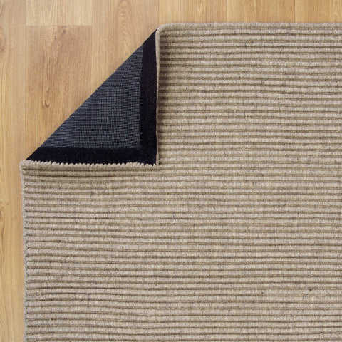 Zoomed-in view of the Zalia Rug's handloomed weave, demonstrating the traditional techniques used in its creation.