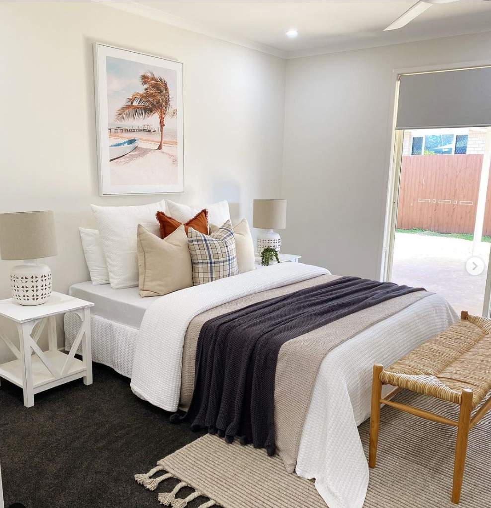 rug at the end of bed inside a modern australian home