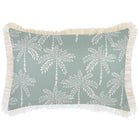 Decorative pillow with palm tree pattern and fringes on a light blue background