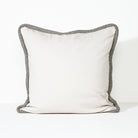 A square throw pillow with a plain off-white center and a textured gray border, shown against a clean white background.