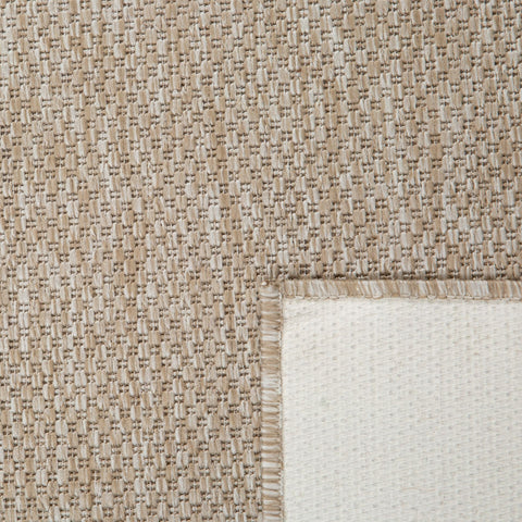 The latex backing of the chino sand rug o