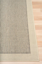 Chino rug in taupe linen that is latex backed on timber flooring