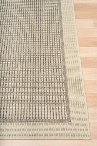 Chino rug in taupe linen that is latex backed on timber flooring