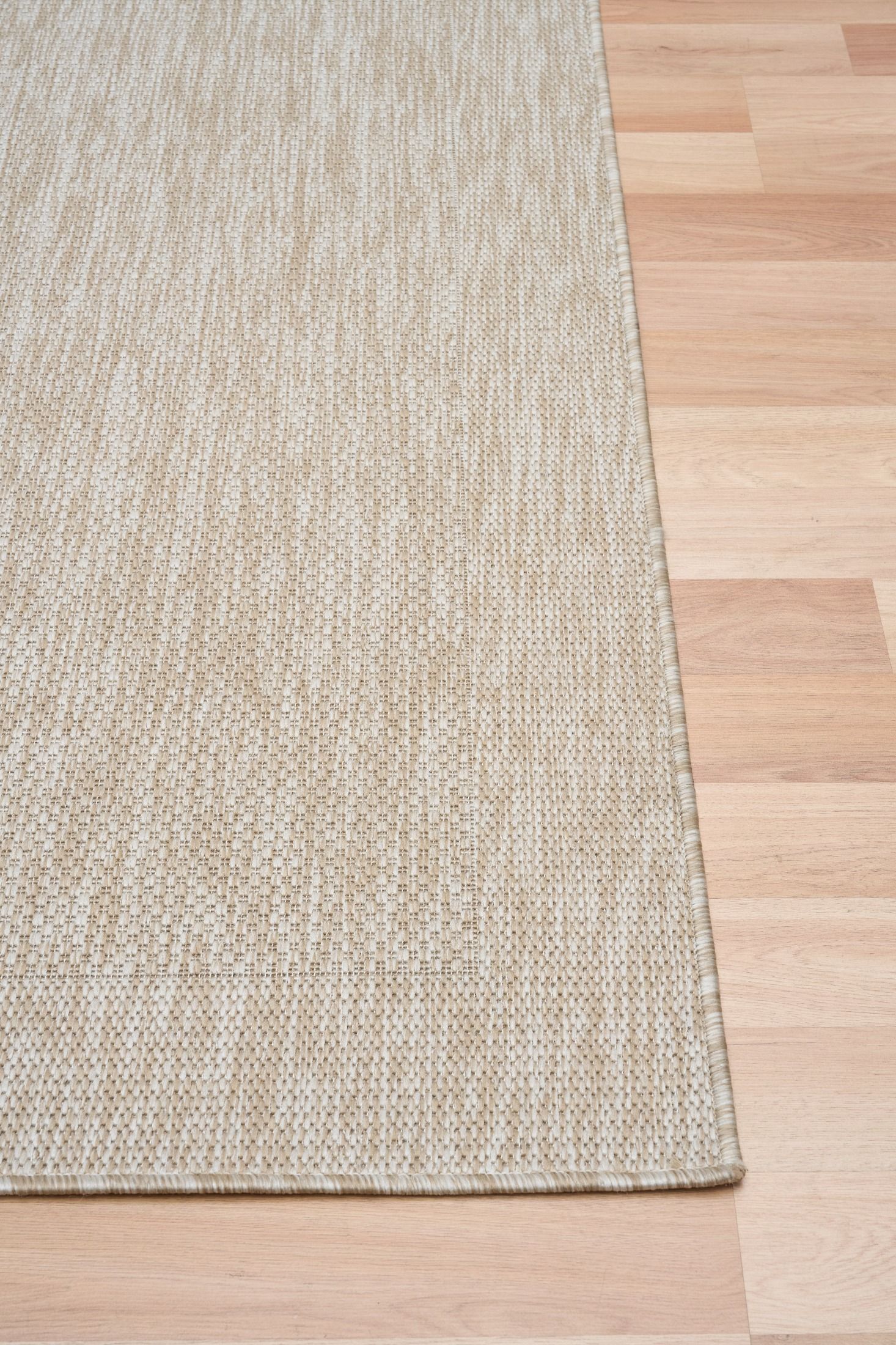 Chino Sand Rug on timber flooring