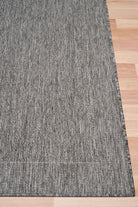 Chino silver white rug on timber flooring