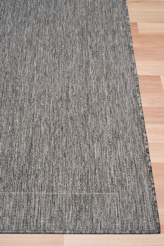 Chino silver white rug on timber flooring