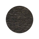 Round swatch of dark gray fabric texture on a white background