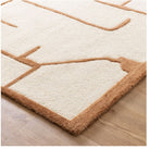 close of white beige rug on timber flooring
