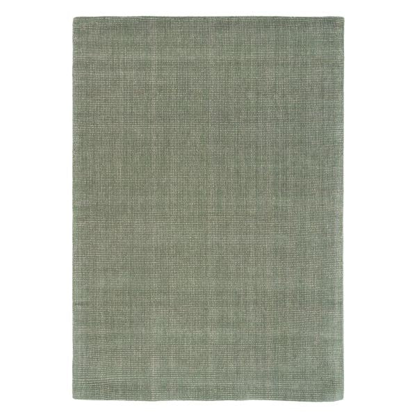 A rectangular area rug with a textured, woven linen-like pattern in a muted sage green color, shown flat against a solid white background.