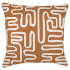 Decorative pillow with white abstract pattern on a brown background