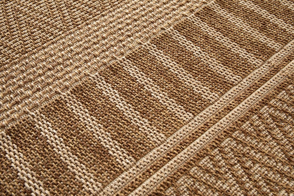 Close-up of a brown and beige woven fabric texture
