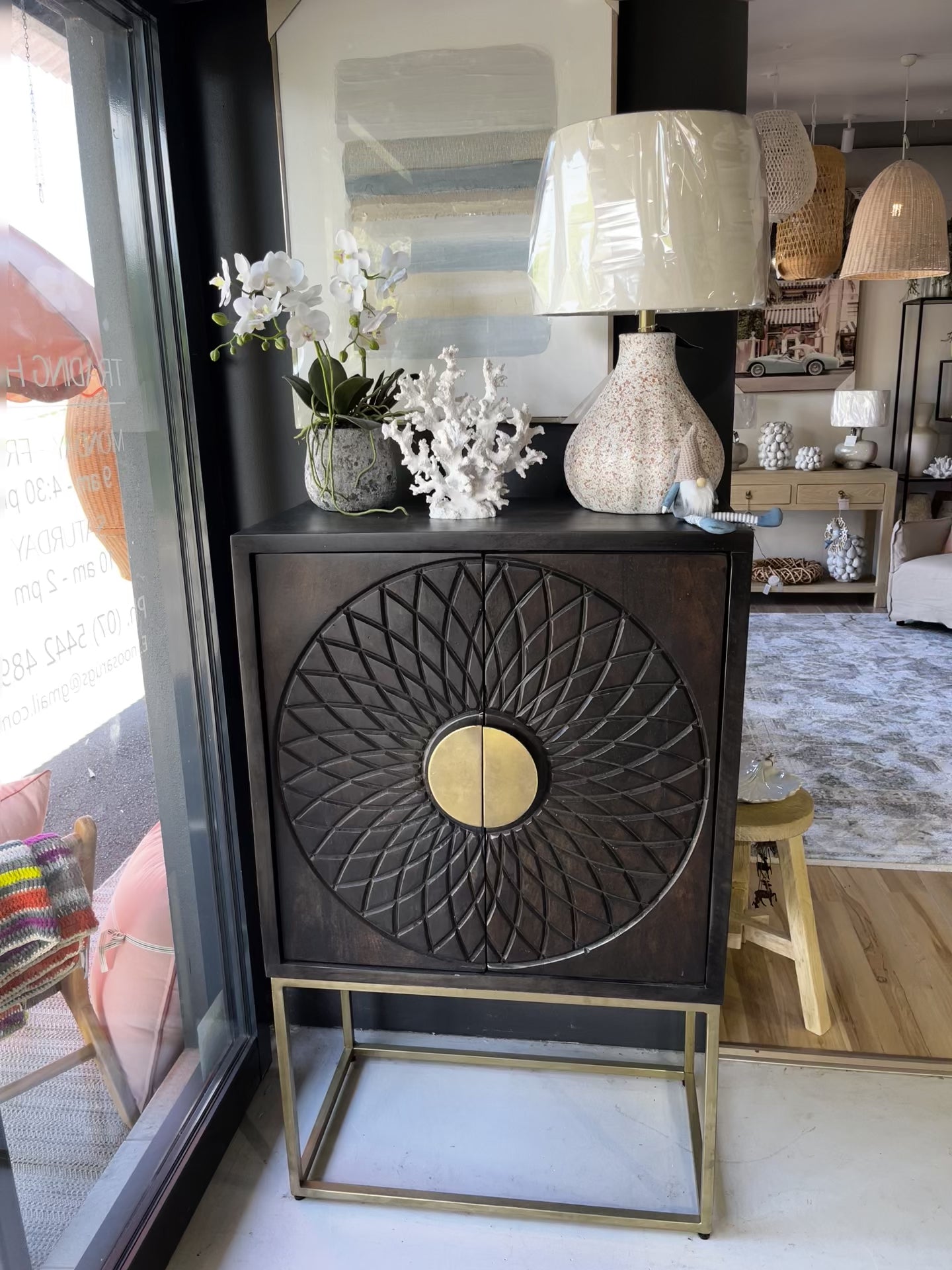 brown gold cabinet in homewares shop