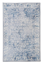 Decorative rug with blue and white pattern on a plain background