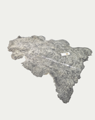 Grey sheepskin pet rug on white background