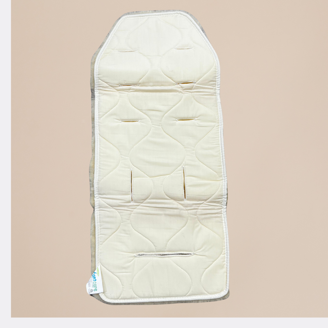 Beige quilted mat on a beige background