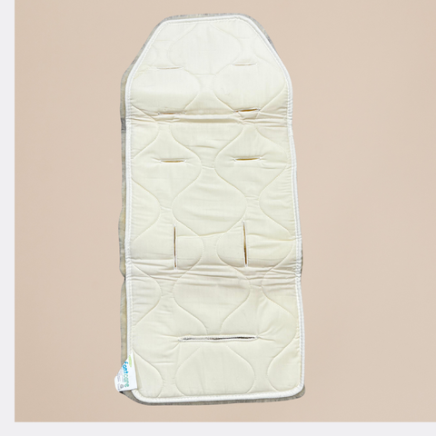 Beige quilted mat on a beige background