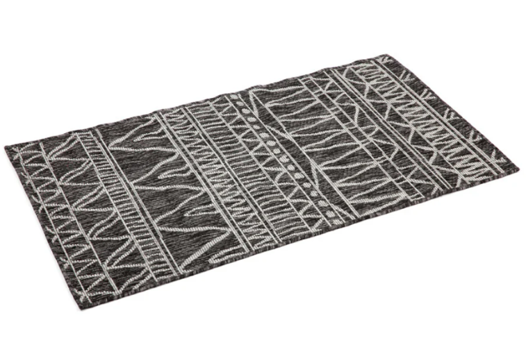 Rectangular doormat with geometric pattern on a white background