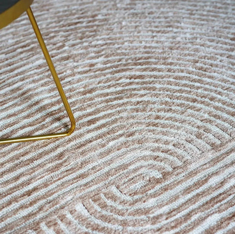 close up of vista rug with gold furniture leg