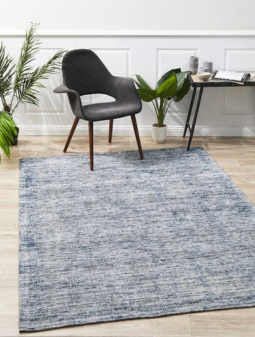 The Allure Rug elegantly placed in a room, illustrating its ability to enhance the aesthetics of a space with its subtle and sophisticated appearance.