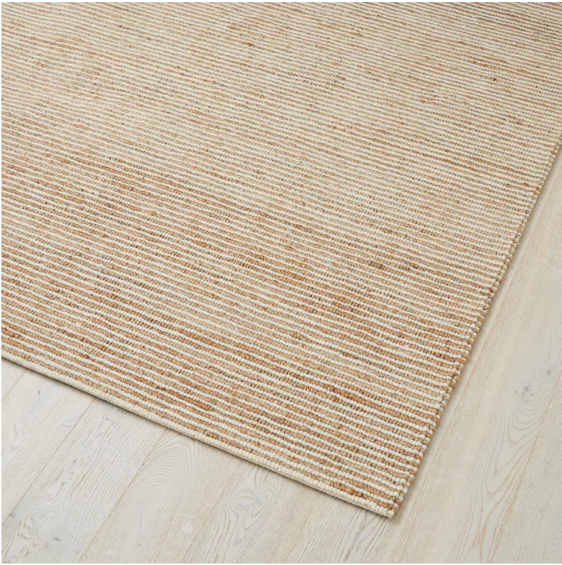 Close-up view of the Lisbon Seasalt rug highlighting the intricate blend of wool and jute in its loop pile design.