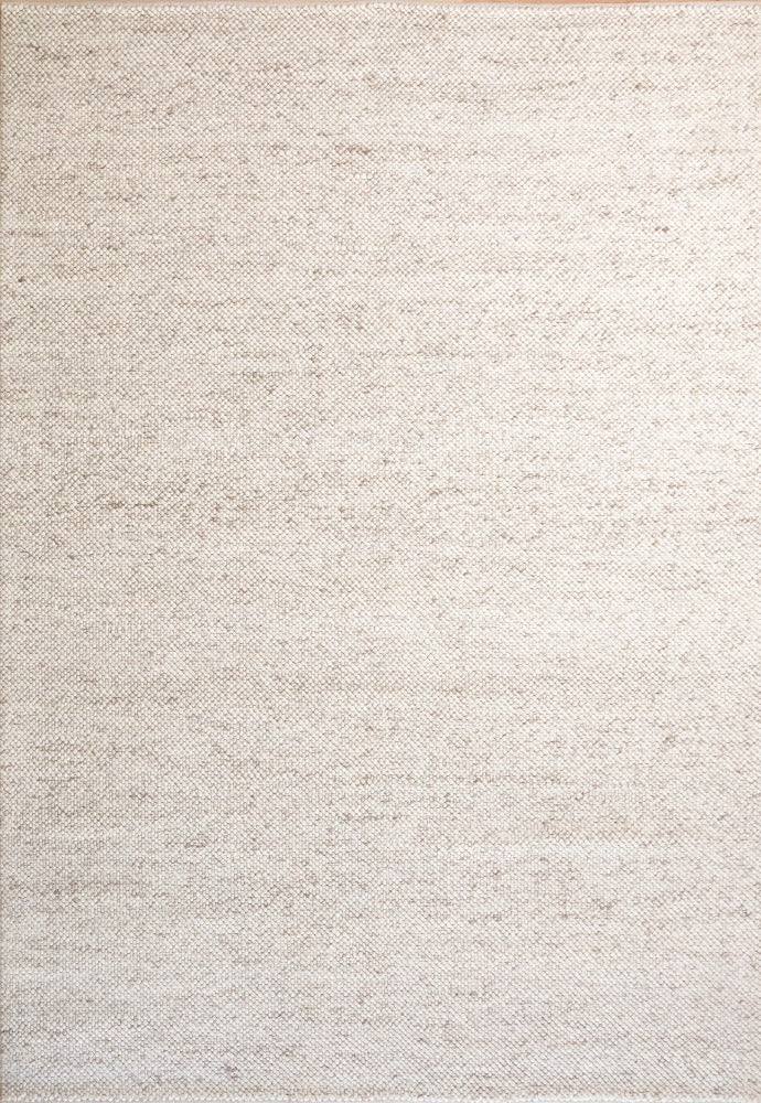 Elegant LUNAR Rug in Almond, showcasing its luxurious 100% wool texture and warm, neutral color, perfect for enhancing the coziness of any living space.