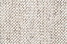 Close-up view of the LUNAR Rug in Almond, highlighting the fine craftsmanship and durable, plush wool material, ideal for high-traffic areas.